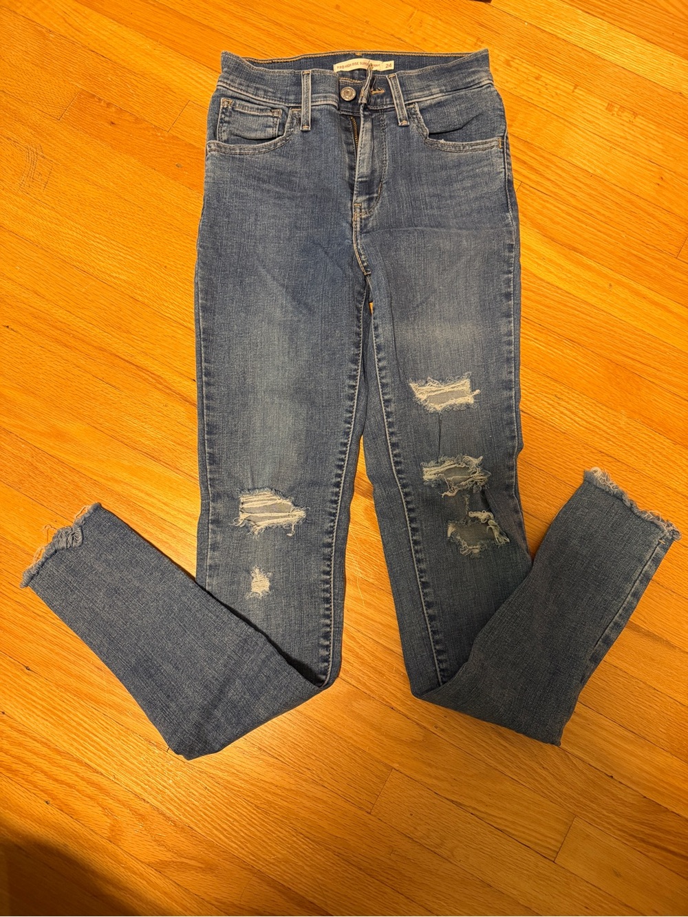 Levi’s Distressed High-Waist Blue Jeans